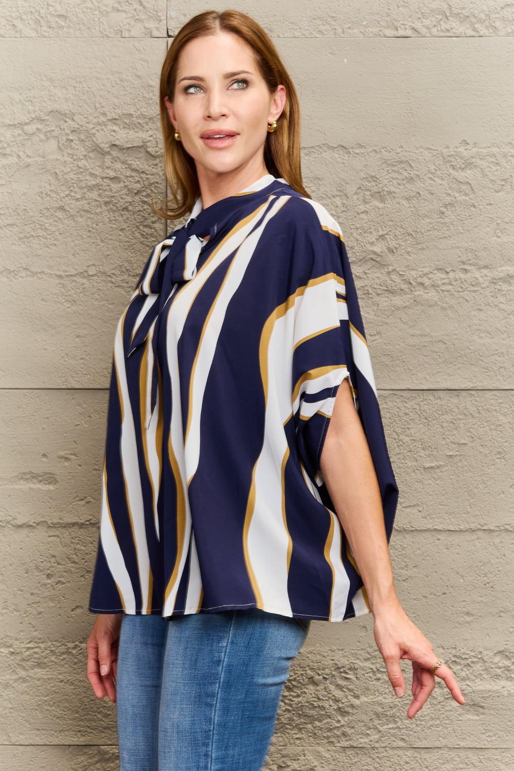 Perfee Tie Neck Printed Slit Sleeve Blouse