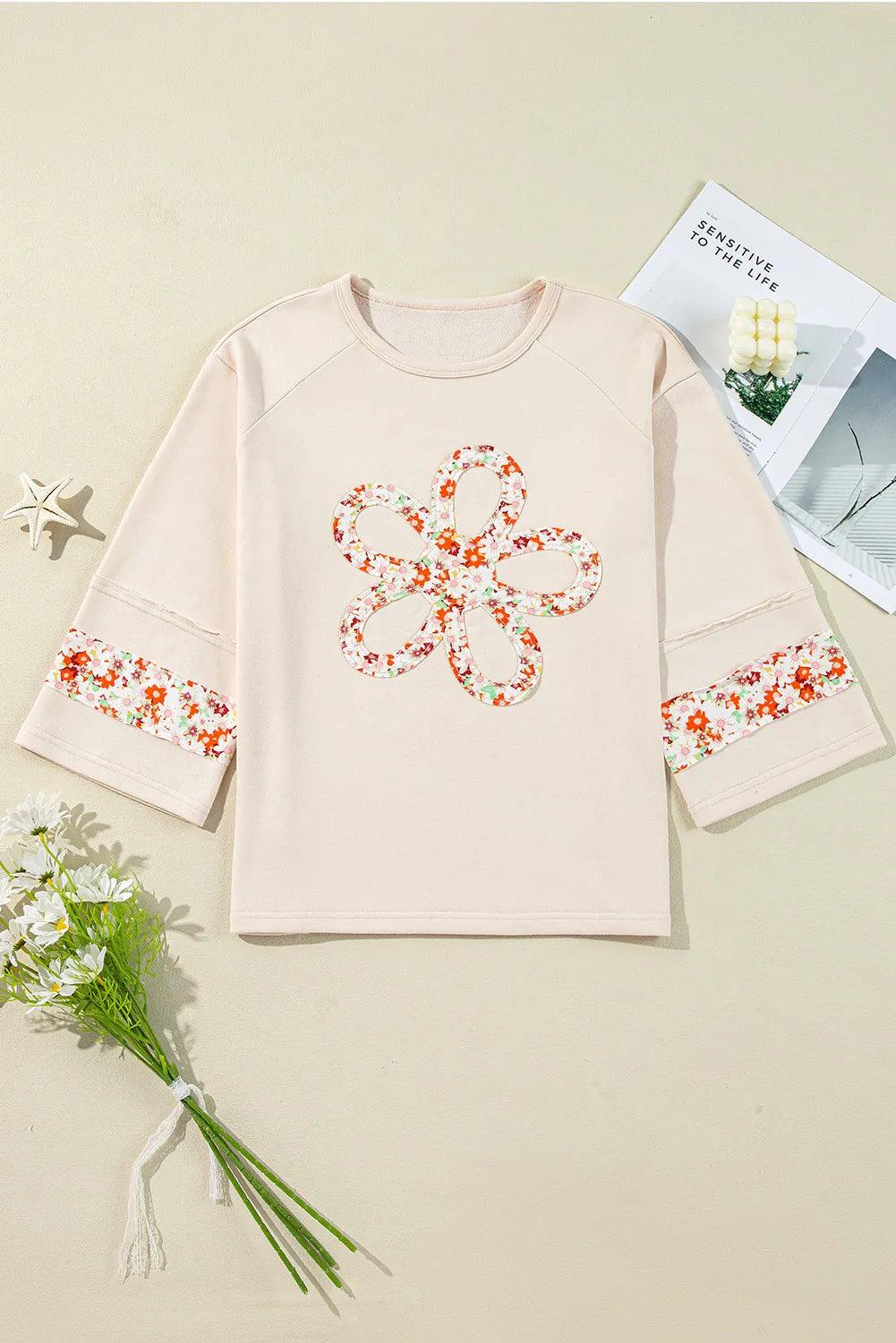 Exposed Seam Slit Floral Round Neck Blouse